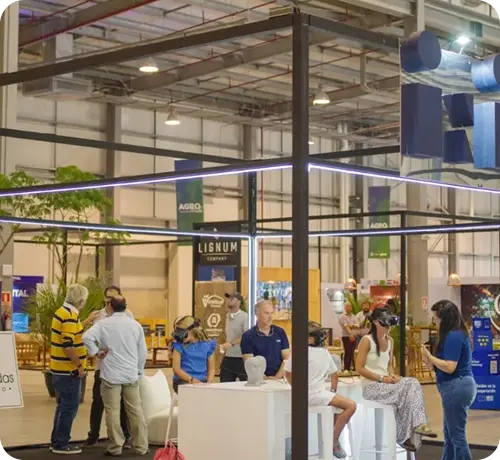 People experiencing VR demonstration at agriculture technology expo booth
