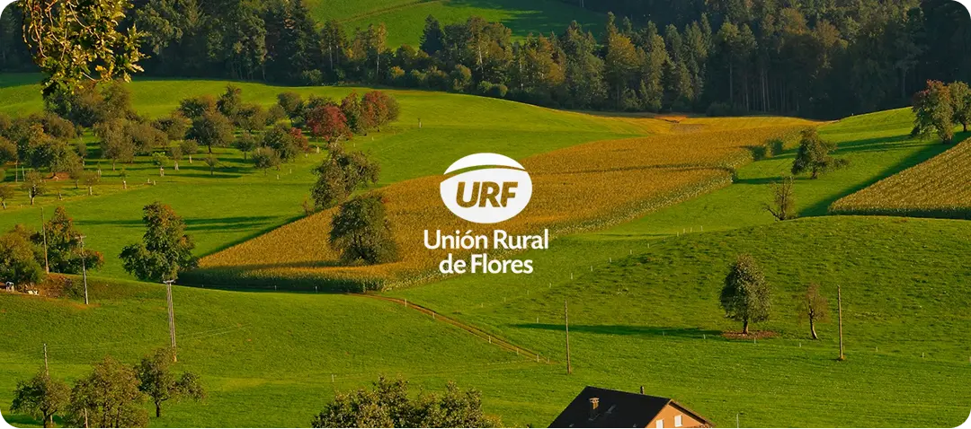 Unión Rural de Flores URF logo over scenic rural landscape.