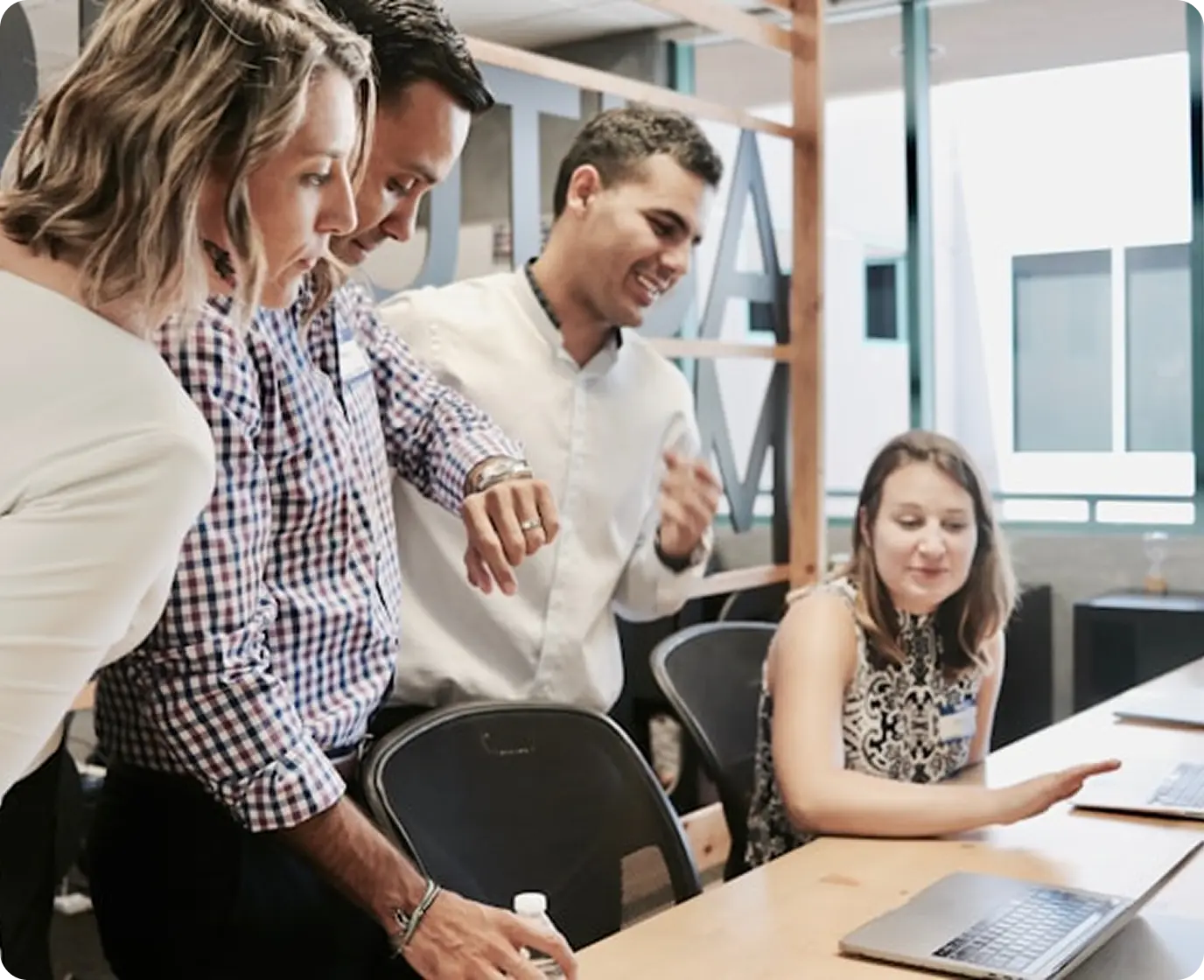 smiling while using laptop at UTE 